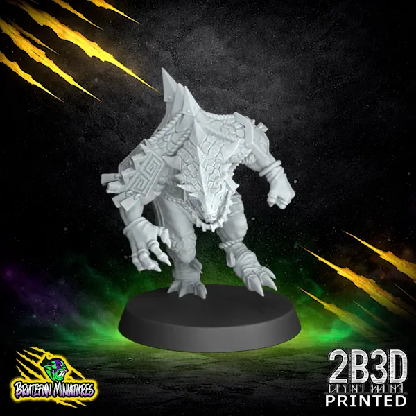 A front-facing view of the Saurus 03 resin miniature in a powerful athletic stance. Sculpted by BruteFun Miniatures and printed by 2B3D, featuring thick scales, geometric shoulder armor, and high-detail resin finish in 32mm scale.